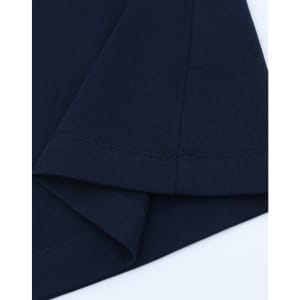 A navy blue long-sleeve cotton tee shirt featuring a hemmed finish and a logo on the sleeve.