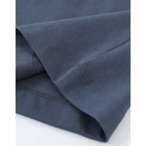 A close-up of a ladies' premium cotton long sleeve tee shirt in navy blue, featuring neatly finished hems and stitching.