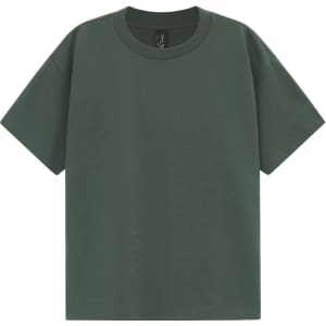 A green unisex heavy cotton oversized tee with a relaxed fit and round neckline. It features a logo on the label.