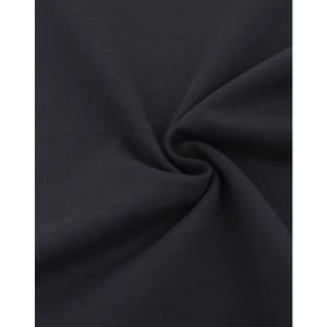 A close-up of a black heavy cotton fabric, showcasing its soft texture and smooth surface.