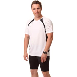 A white men's T-shirt with black side panels and a logo, modelled by a person, paired with black shorts.