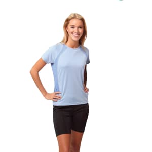 A light blue ladies' t-shirt with short sleeves, featuring side panels, worn by a smiling model.