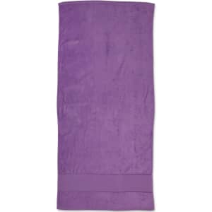 A purple terry velour beach towel measuring 75x150 cm, featuring a plain design with a logo.