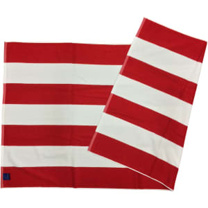 A striped beach towel featuring red and white horizontal stripes, with a small logo in one corner.
