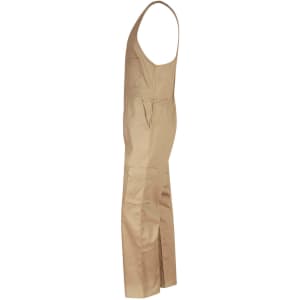 A tan cotton drill overall with an action back design features multiple pockets and a simple, functional style.