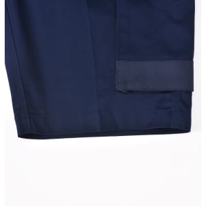Navy blue unisex utility stretch cargo work shorts with a cuffed hem and branding.