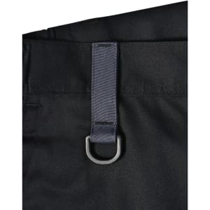 A close-up of a black unisex utility stretch cargo work pant featuring a fabric loop and metal ring detail.