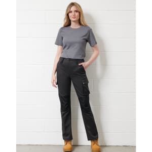 Unisex utility stretch cargo work pants in black, paired with a grey t-shirt and yellow boots, featuring a logo.