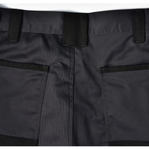 A pair of black unisex cargo work pants featuring multiple pockets and a sturdy waistband.