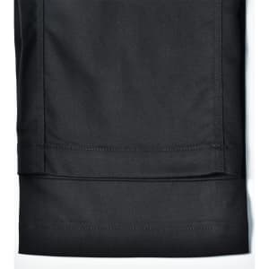 A pair of black utility stretch cargo work pants featuring a cuffed hem and visible stitching details.