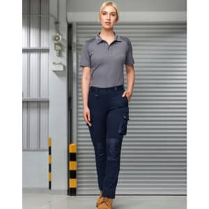 Unisex navy cargo work pants with multiple pockets, worn with a grey polo shirt. Features a logo.