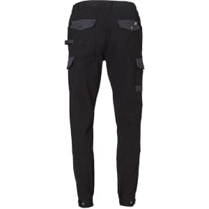 A pair of black work pants featuring grey accents and multiple pockets, with a logo on the waistband.