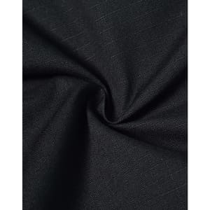 A close-up of black rip-stop poly/cotton fabric, showcasing its textured weave and durable quality.
