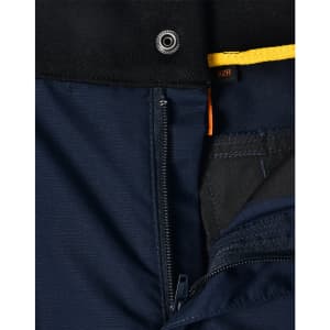 A close-up of navy Rip-Stop Poly/Cotton Stretch Work Pants, showcasing the zipper and fabric texture. Features a logo.