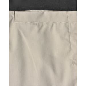 Rip-stop poly/cotton stretch work pants in a light beige colour with a black waistband and stitching details.