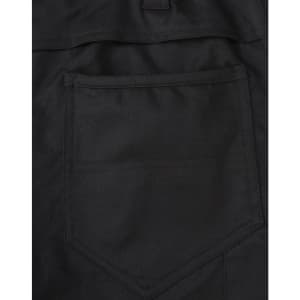 A close-up of black cotton stretch ripstop work pants, featuring a back pocket design and fabric texture.