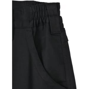 A close-up of unisex cotton stretch ripstop work pants in black, featuring a textured waistband and side pockets.
