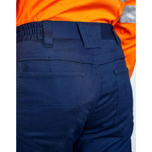 Navy blue unisex cotton stretch ripstop work pants with an elastic waistband and back pockets. Features a logo.