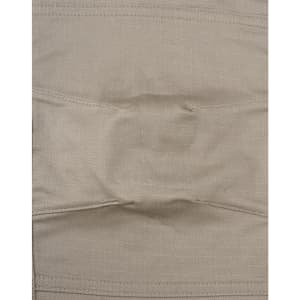 A close-up of unisex cotton stretch ripstop work pants in a light beige colour, featuring a stitched waistband and branding.