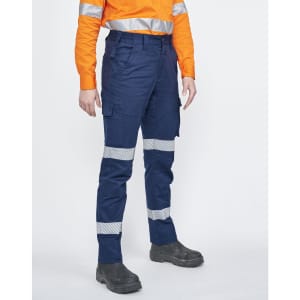 Unisex cotton stretch ripstop segmented work pants in navy with reflective strips, paired with an orange long-sleeve shirt.