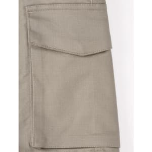 Unisex cotton stretch ripstop work shorts in a light beige colour featuring side pockets and a logo.