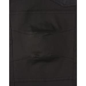 A close-up view of unisex black cotton stretch drill cuffed work pants, featuring pockets and a sturdy design.