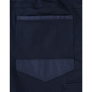 A navy blue fabric with a pocket detail, part of the unisex cotton stretch cuffed work pants.