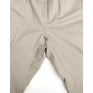 Unisex cotton stretch drill cuffed work pants in a light beige colour, featuring a flexible design and logo.