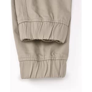 A pair of unisex cotton stretch drill cuffed work pants in khaki, featuring elastic cuffs and a simple design.