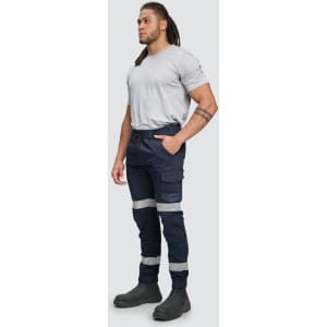 Cotton stretch drill cuffed work pants in navy blue with reflective tape details, worn by a standing male model.