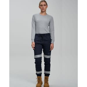 Cotton stretch drill cuffed work pants in navy blue with reflective tape, paired with a grey long-sleeve top.