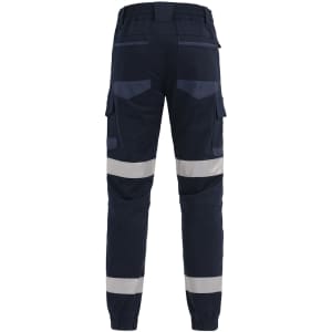 Cuffed work pants in navy with reflective tape and multiple pockets. Features an elastic waistband at the back.