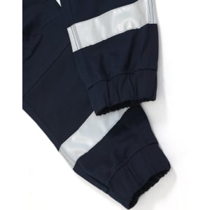 Navy work pants with reflective tape and cuffed ankles, featuring a logo on the fabric.