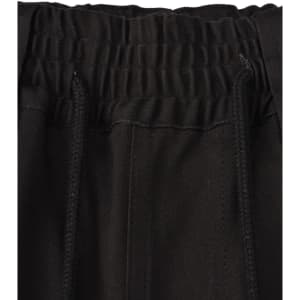 A close-up of the waistband of black unisex cotton stretch drill work shorts, featuring an elastic band and drawstring.