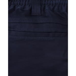 A close-up of navy unisex cotton stretch drill work shorts, featuring an elastic waistband and stitching details.