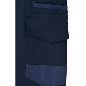 A close-up of navy unisex cotton stretch drill work shorts, featuring multiple pockets and a sturdy design.