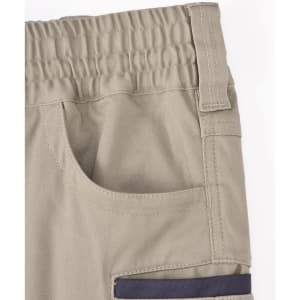 Unisex cotton stretch drill work shorts in beige, featuring an elastic waistband and a side pocket.