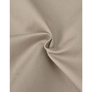 A close-up of beige cotton stretch drill fabric, showcasing its smooth texture and subtle sheen.