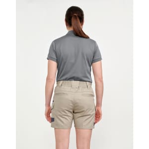 A pair of unisex cotton stretch drill work shorts in khaki, featured with a back view of a person wearing them.