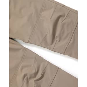 Flexible work pants in a tan colour, featuring detailed stitching and a subtle logo on the fabric.