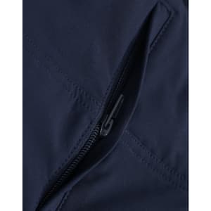 A close-up of navy water-repellent flexi work pants featuring a zippered pocket and detailed stitching.