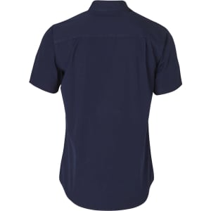 A navy blue short sleeve work shirt featuring a collar and a back yoke, with a branding logo on the label.