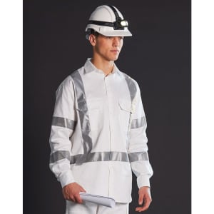 A white safety shirt with reflective stripes, worn by a model in a hard hat and headlamp, standing against a dark background.