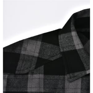 A black and grey plaid flannel shirt with a collar and button-up design, featuring a logo.