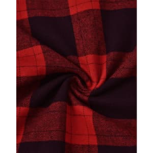 A close-up of a unisex flannel plaid shirt featuring a red and black pattern with a soft texture.