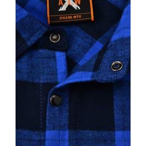 A close-up of a navy and blue flannel plaid button-up shirt featuring black buttons and a brand label.