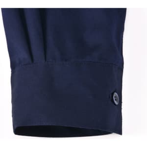 A navy long-sleeve work shirt featuring a closed front and buttoned cuff detail. It has a logo.