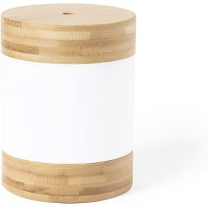 A cylindrical humidifier with a white body and bamboo ends, featuring a small opening at the top and a logo.