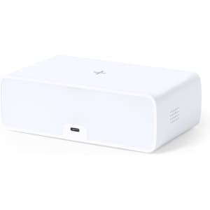 A white multifunction alarm clock with a USB-C port, featuring a speaker grille and a simple design.