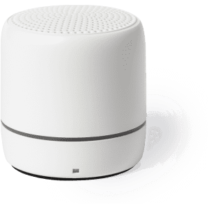 A white round speaker with a perforated top and a contrasting band around the middle, featuring a logo.